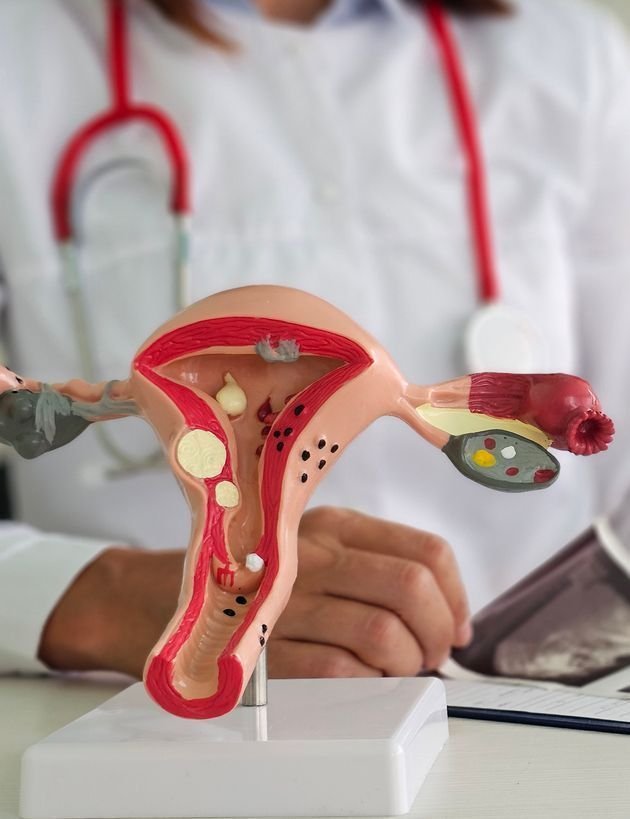 Hands holding a family silhouette